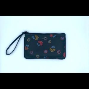 Coach floral clutch with wrist strap